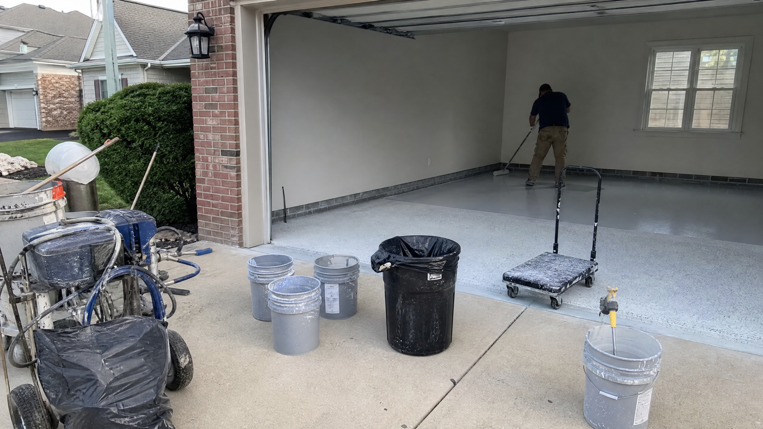 Epoxy Garage Floor Coating in progress at a American residential property — professional service in Sumter County, SC