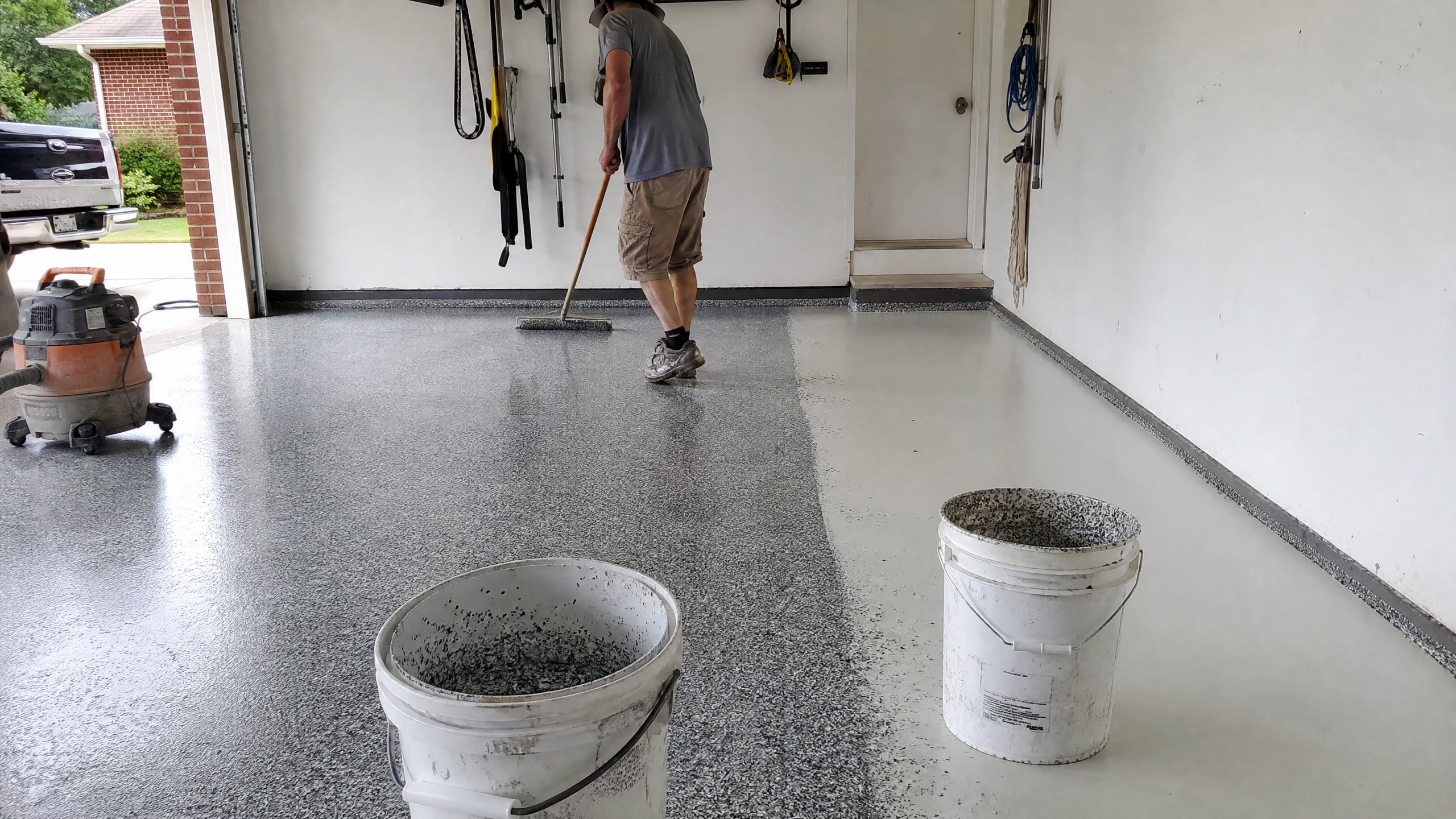 Flake (Chip) Garage Floor Coating in progress at a American residential property — professional service in Sumter County, SC